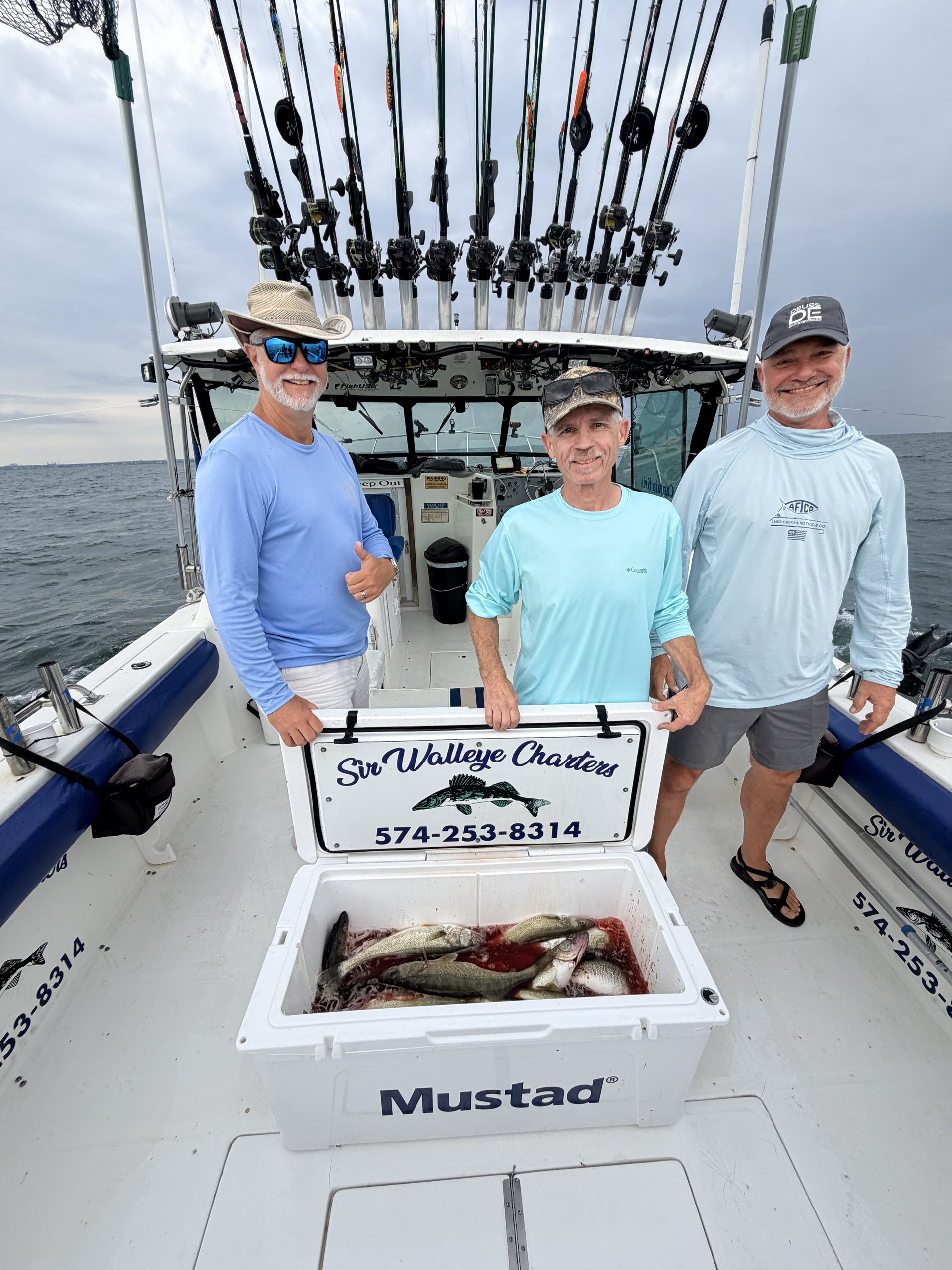 Sir Walleye Charters clients aboard on a calm Lake Erie Central Basin day - walleye trip July 2026