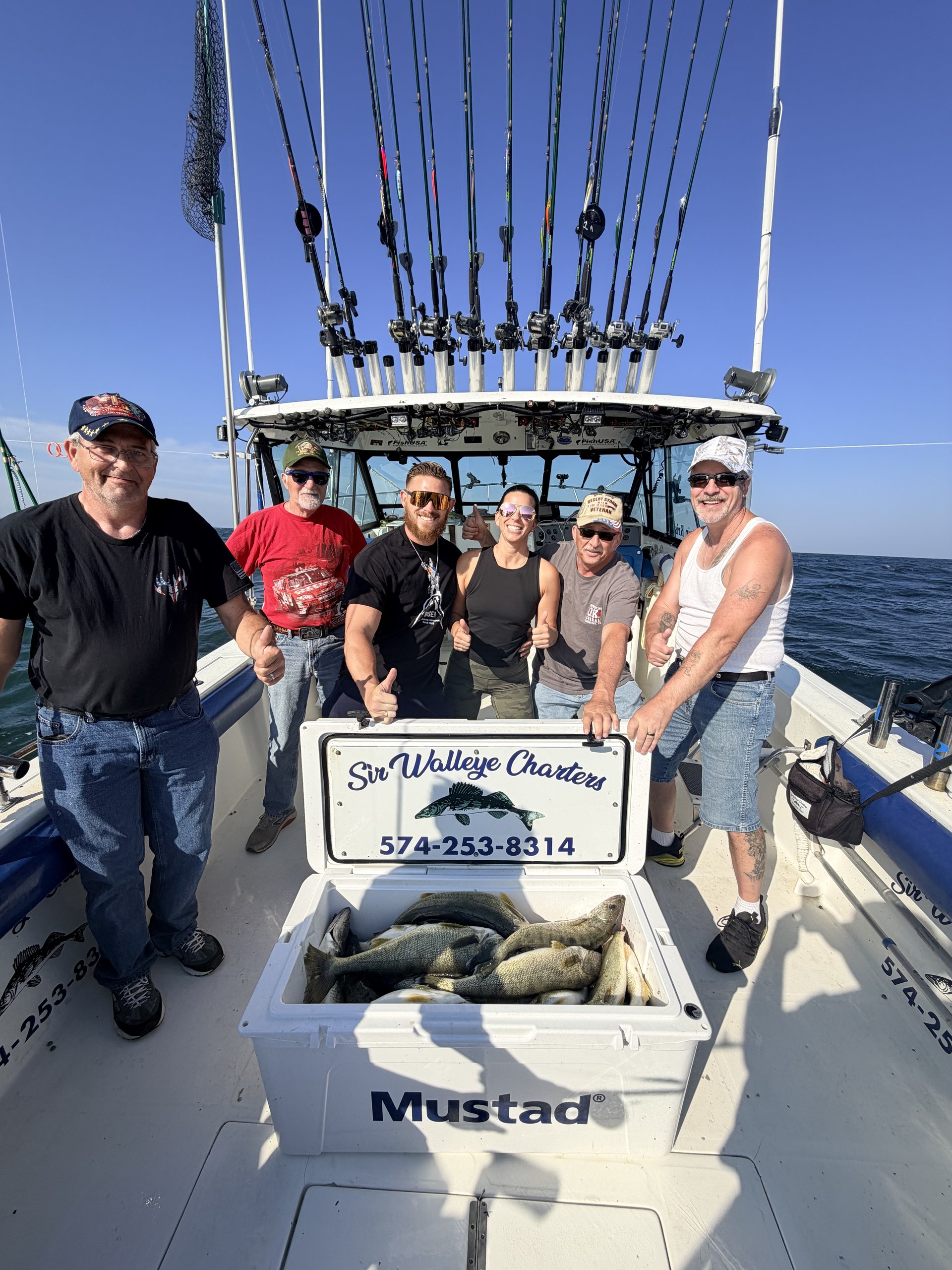 Group of Sir Walleye Charters clients dockside after a Lake Erie walleye charter