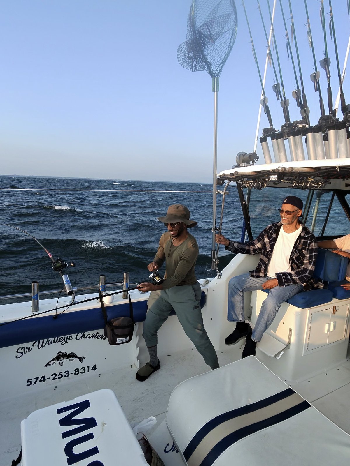 Sir Walleye Charters client fighting a Lake Erie walleye on the troll - Central Basin action