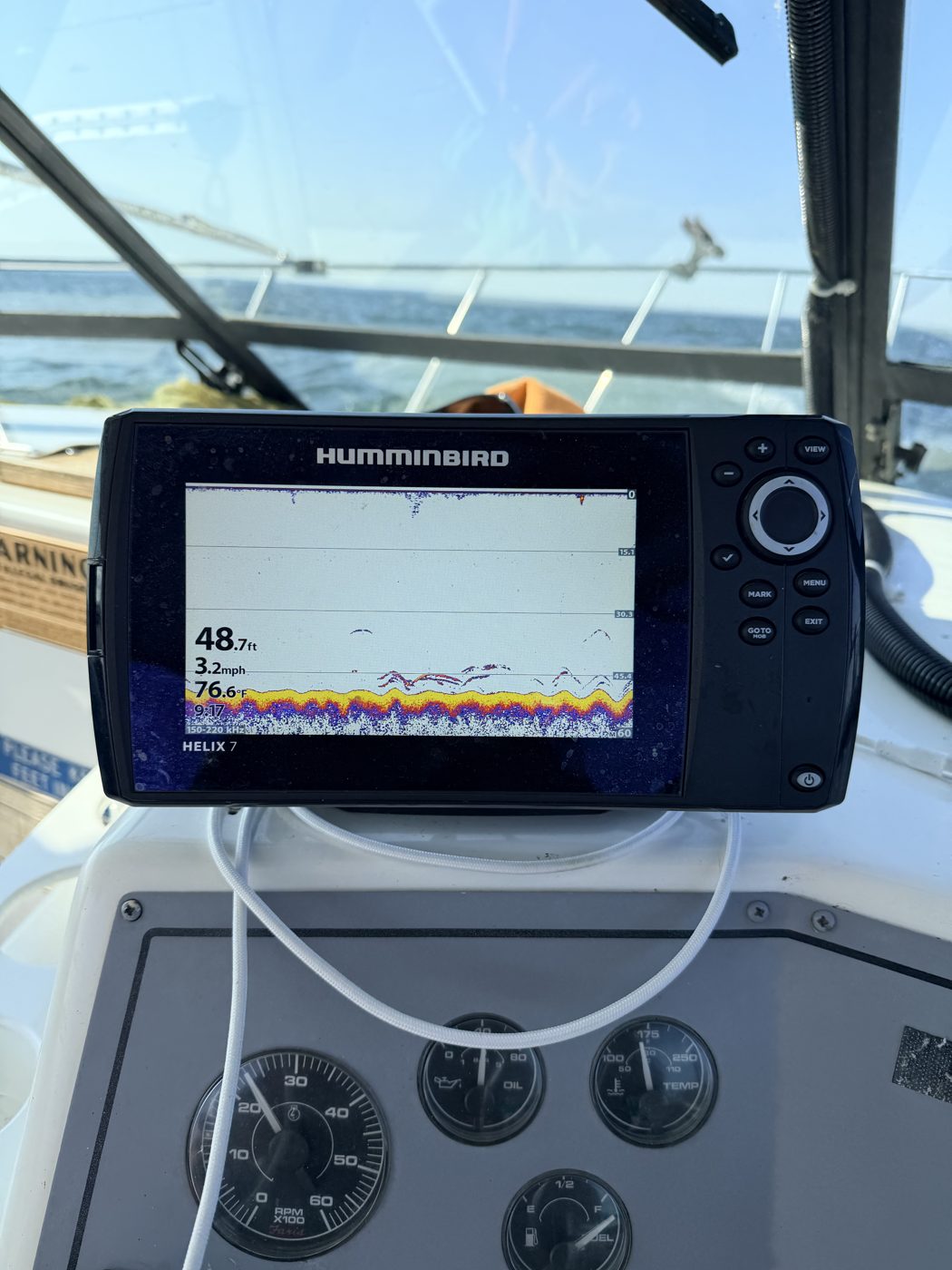 Humminbird sonar showing Lake Erie walleye marks around 48 feet at 76 degrees - Sir Walleye Charters Central Basin