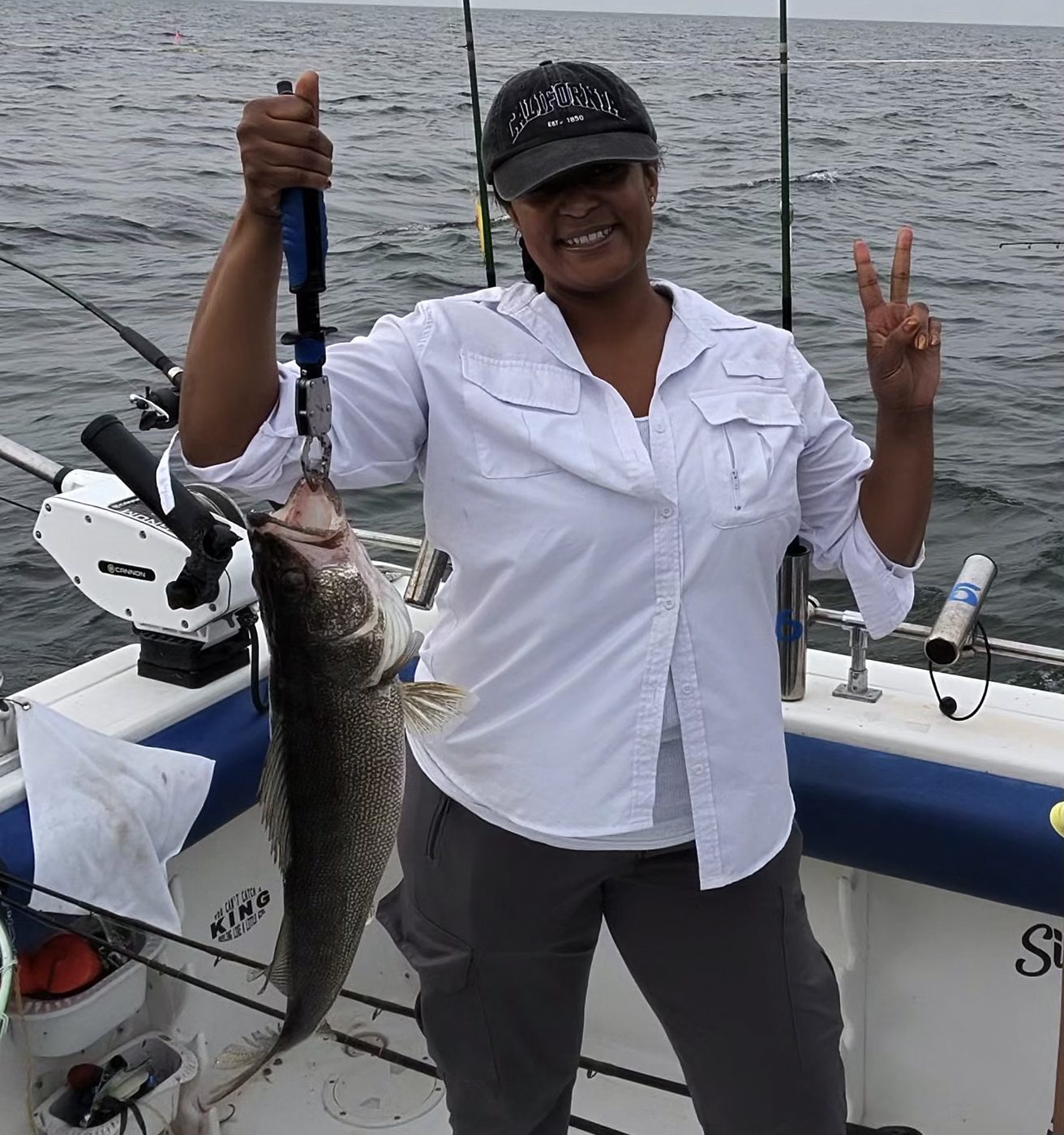 Happy Sir Walleye Charters client holding a big Lake Erie walleye caught in the Central Basin out of Lorain