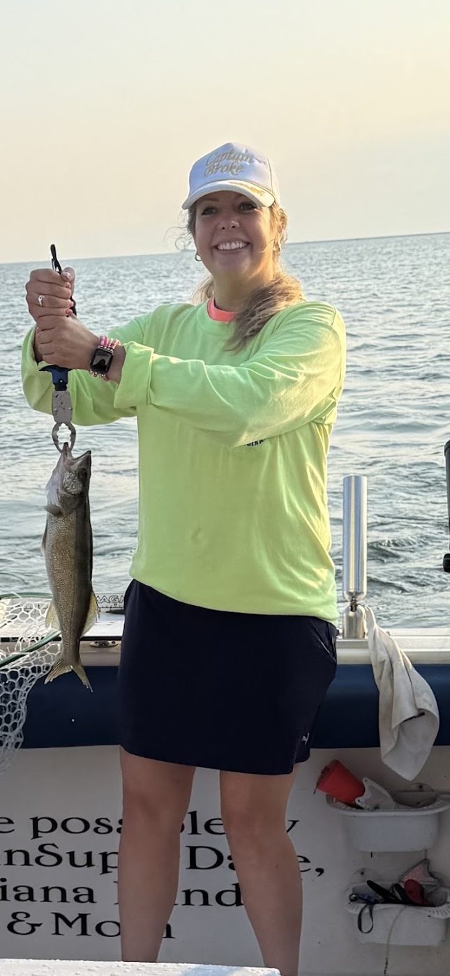 Happy Sir Walleye Charters client with a Lake Erie walleye during the late-August hypoxia bite out of Lorain