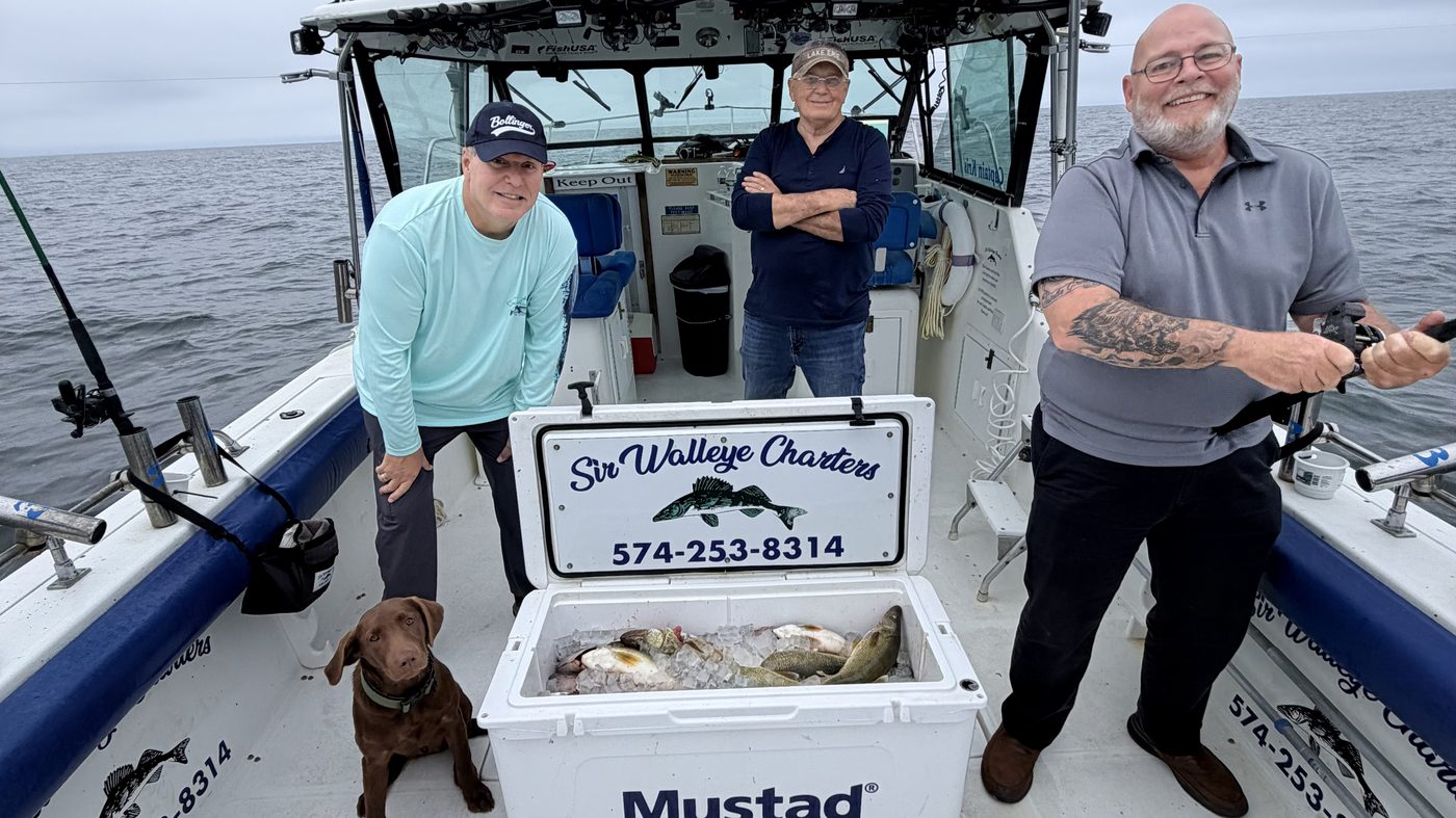 Anglers aboard Sir Walleye Charters with a Mustad cooler full of Central Basin Lake Erie walleye out of Lorain, Ohio